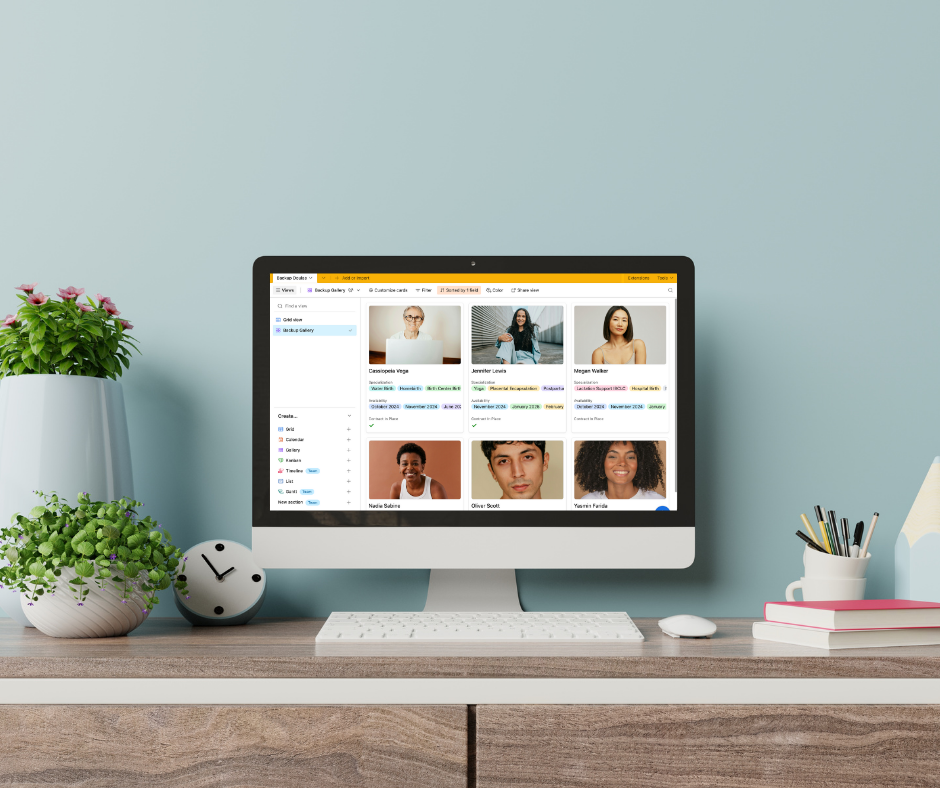 A computer on a desk with an image of doulas as a product for Doula Backup Tracker.