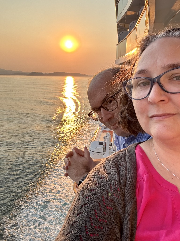 Robin and Kevin on the balcony watching the sunset