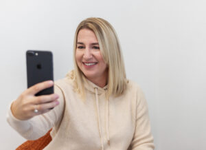 Doula recording a reel for instagram