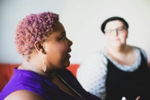 Two women talking.